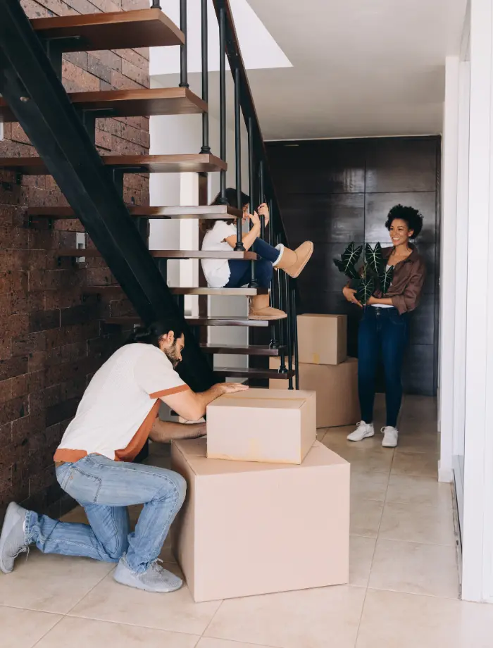 Experienced home movers carrying furniture from a Sunshine Coast family home